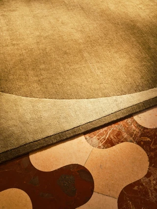 Doma rug in Forest, corner detail showing the curved border