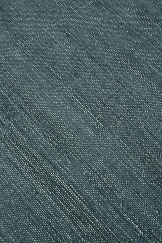 Close-up of Vara rug in Aegean, showing silk-wool tactile contrast