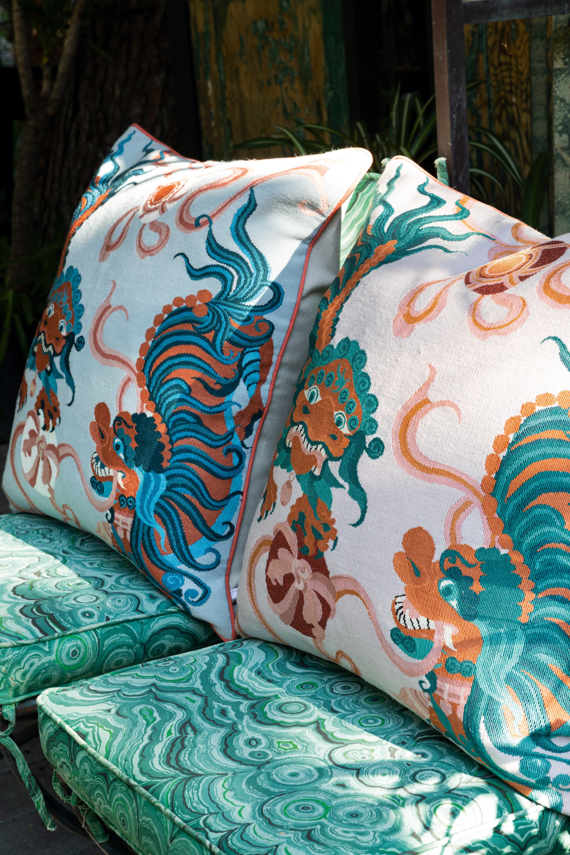 Lion Dance Pink by Guo Pei cushion insitu