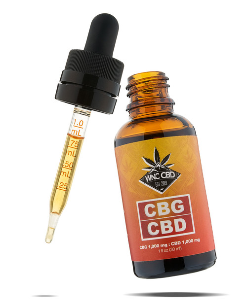 1,000mg CBG : 1,000mg CBD Oil Tincture bottle and dropper with amber liquid, WNC CBD. 1,000mg CBG : 1,000mg CBD Oil Tincture bottle and dropper with amber liquid, WNC CBD.