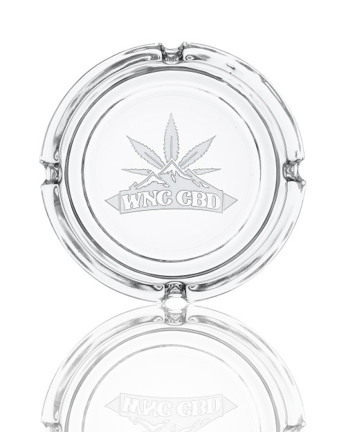 WNC CBD Custom Glass Ash Tray with engraved leaf design, clear round accessory.