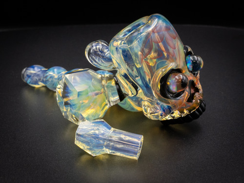 AKM x Swank Skull Lock Glass Pipe featuring colorful skull design, iridescent glass, part of WNC CBD Glass Accessories.