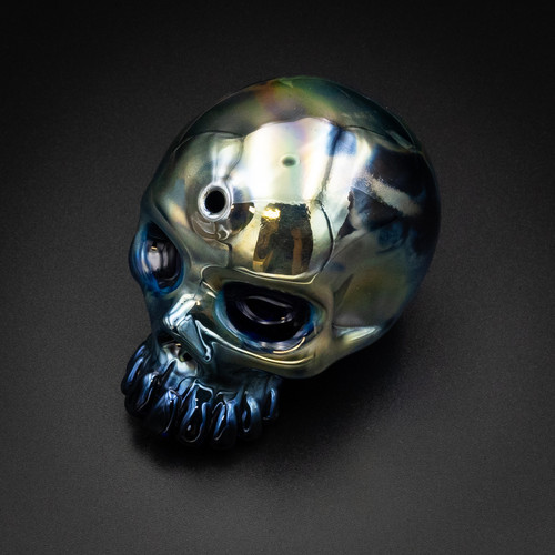 Scoz Fumed Skull Glass Pipe featuring color-shift design, part of WNC CBD's Glass Accessories collection.