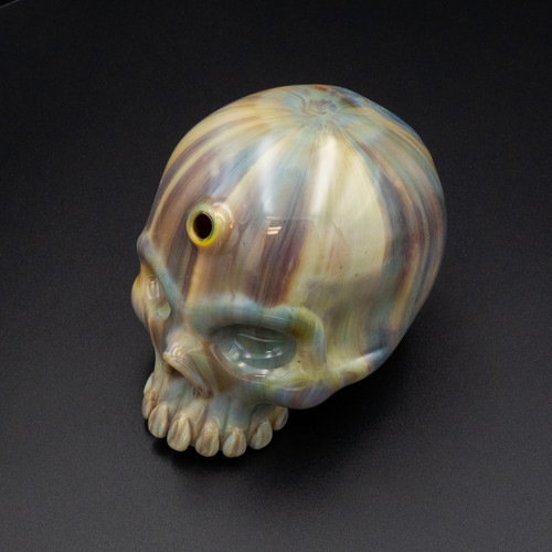 Scoz Bone Skull glass pipe with a realistic skull design in multicolored glass.