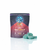 WNC's Blue Raspberry Slushy Deep Space Gummies in a purple 5 count bag, with blue square gummies piled on the side