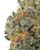 Close up of a dense Cherry Tarts cannabis bud, displaying lime and olive green foliage and dark purple hues intertwined with yellow-orange pistils and heavily coated in white crystal trichomes