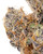 Close up of a dense Sour Garlic Cookies cannabis bud with olive green leaves and dark purple undertones, fiery orange pistils, and a frosty coating of resinous trichomes