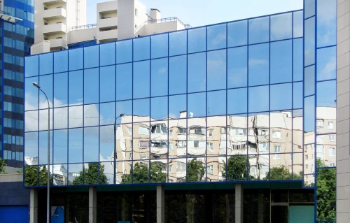 Lifestyle 1 — Storefront exterior showing silver mirror finish