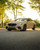 A Mercedes E63 AMG wrapped in KPMF K75500 Satin Stealth Tundra Vinyl presents a stylish tan satin finish, enhancing the high-performance sedan's aerodynamic curves and aggressive stance. The KPMF wrap’s superior satin effect elevates the E63 AMG’s sporty profile, offering a unique, luxurious aesthetic for both street and track-ready style.