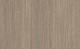 Natural driftwood oak wood grain architectural film with embossed weathered texture. Medium taupe-gray tone perfect for rustic coastal, organic farmhouse, and authentic beach house interiors. Versatile weathered character. 48"×164' roll. 10-year durability.