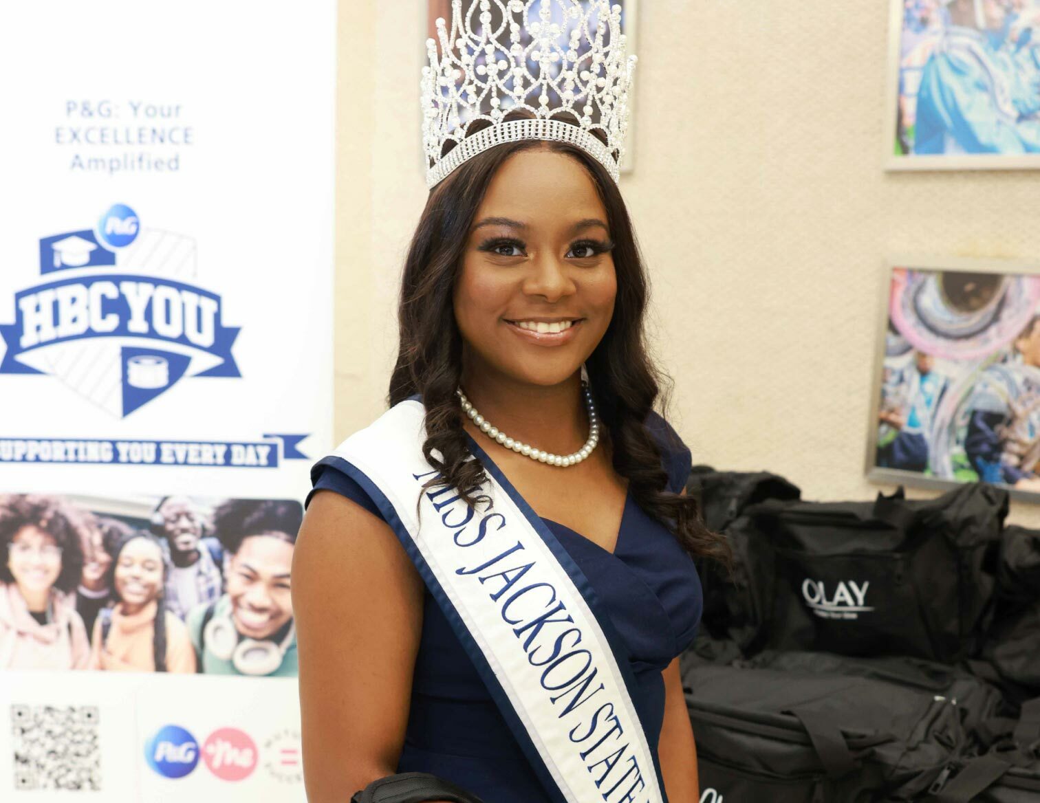 African American female at HBCU event wearing a tiara and navy dress