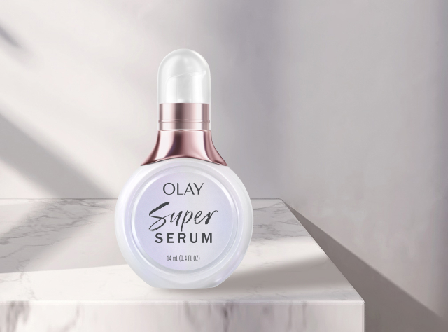 Olay Super Serum Mini on a white marble countertop and discount code 3MINI