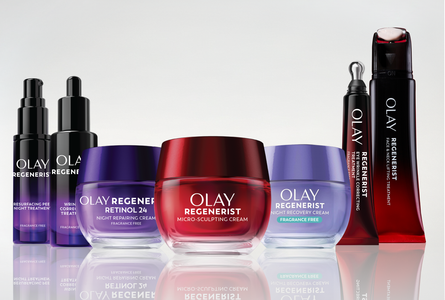 Group of Olay Regenerist products ranging from serums to moisturizers to facial treatments posed in front of a grey background.
