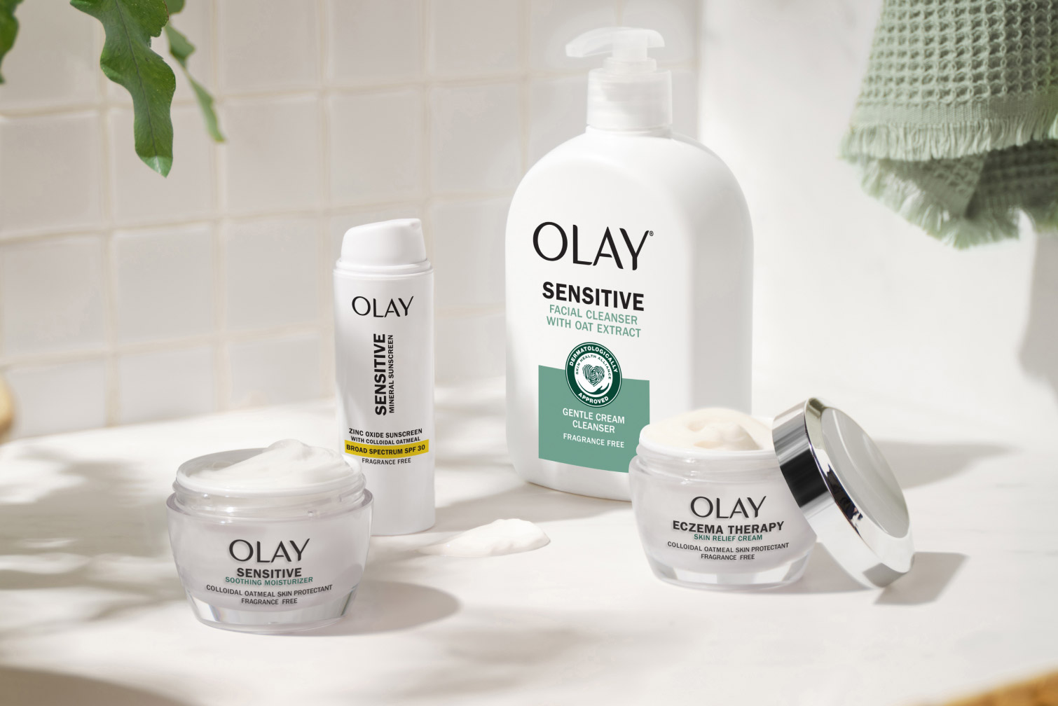 Olay Sensitive collection of products displayed on bathroom countertop