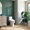 Brondell Swash SE600 bidet toilet seat installed in a bright modern bathroom with green tile, wood flooring, and natural light.