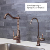 Sequoia water filter faucet in antique bronze with filter change indicator installed next to the kitchen faucet
