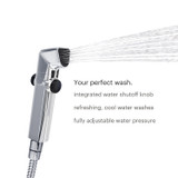 Brondell SimpleSpa essential hand-held bidet sprayer with water in action. copy:  Your perfect wash.  integrated water shutoff knob, refreshing, cool water washes, fully adjustable water pressure.