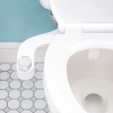 Brondell FreshSpa comfort+ essential bidet attachment with dual nozzle installed in tile bathroom