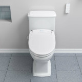 Brondell Swash CL950 bidet toilet seat installed in bathroom from a front view