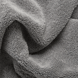 Close up to the fabrics of the Nebia Hand Towel Gray