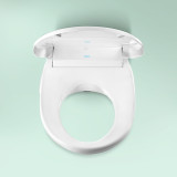 Omigo SL Advanced Bidet Toilet Seat with Remote Control lid open top view against mint background