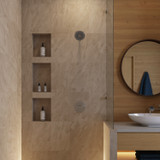 Matte black showerhead installed in a modern bath.