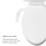 EasySpa Bidet Attachment with ergonomic side control dial installed on a toilet, offering adjustable water pressure from a gentle spray to a full, powerful cleansing stream