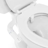 EasySpa Bidet Attachment with ergonomic side controls and dual nozzles installed on a white toilet, featuring a sleek dial for adjustable water pressure and front or rear cleansing options