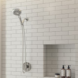 Chrome Brondell Nebia Merced 4-Setting Commercial Handshower installed in a modern with white brick style tiles.