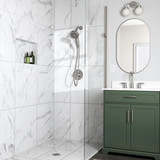 Nebia Merritt 5-Setting Handshower with HaloNetic Double Docking System in brushed nickel installed in a modern bathroom with carrera white marble and sage green cabinets.