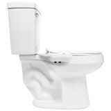 Side view of white toilet with PureSpa Advanced Warm Water Bidet Attachment installed, showing control knobs and sleek, integrated design.
