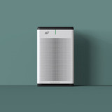 Aurabeat air purifier in front of a green background