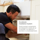 Installer demonstrating the Jema Faucet’s Accelerate Installation System under a kitchen sink, with callout text highlighting quick-connect components that enable fast, tool-free setup without a plumber.