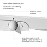 “Close-up of the Swash CL150 non-electric bidet toilet seat control dial, showing a side-mounted knob used to select front or rear wash, activate self-cleaning nozzle function, and fine-tune water pressure.