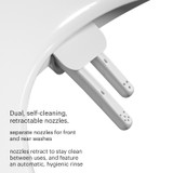 Close-up of the Swash CL150 non-electric bidet toilet seat showing dual, self-cleaning, retractable spray nozzles for front and rear washing, designed to retract when not in use for improved hygiene.