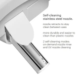 Swash CL2800 Luxury Bidet Toilet Seat closeup of Self-Cleaning stainless steel nozzle.  Nozzle retracts to stay clean between uses.  More durable and easier to clean than plastic nozzles.  2 self-cleaning modes:  on-demand nozzle rinse and UV nozzle cleaning.