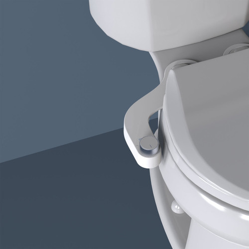 Brondell FreshSpa comfort+ essential bidet attachment with dual nozzle installed in front of a blue background