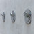 Nebia Multi-Purpose Hook Set Chrome on a gray wall