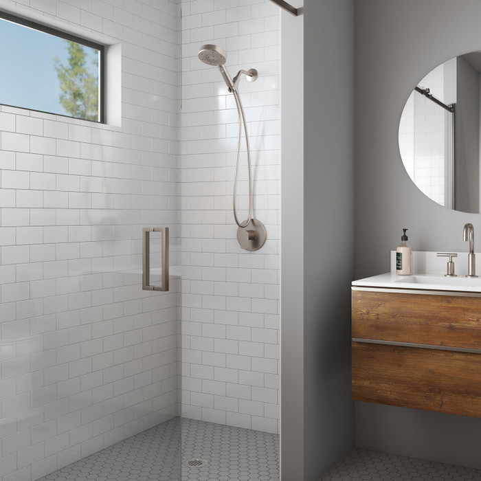Nebia Yuba 5-Setting Handshower in a modern bathroom with a natural wood cabinet.