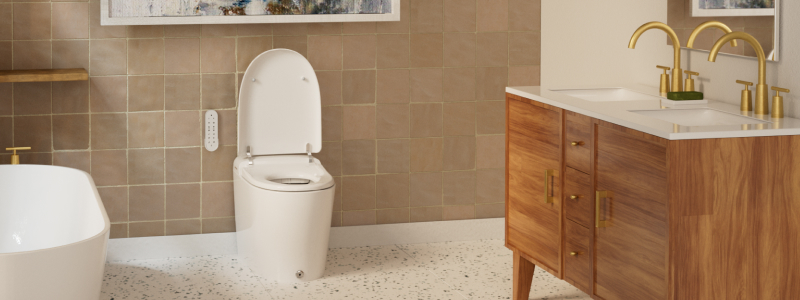 Coit Integrated Smart Bidet Toilet in a modern bathroom, featuring a sleek one-piece design, wall-mounted remote control, warm wood vanity, and contemporary finishes.
