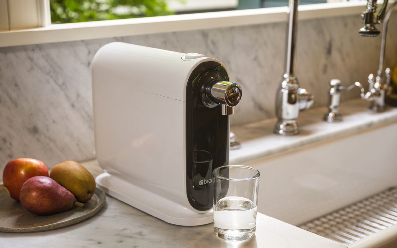 Brondell Cypress Three-Stage Countertop Water Filtration System installed on marble countertop.