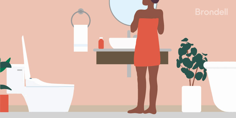 graphic of woman getting ready in front of bathroom mirror wearing red towel wrapped around body with green plant next to luxurious bathtub on right and bidet toilet on left with another green plant accent