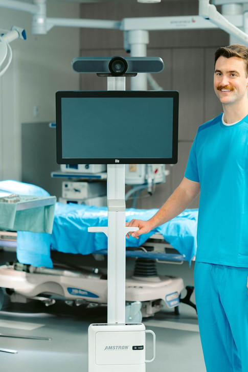 Medxp400  on Capsahealth Tryten X1 cart with Elo Touchscreen and Logitech Webcam with Male Nurse