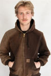 Model is 6'2" and a size men's medium in new clothing wearing this Carhartt Jacket