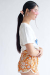 Orange Flashback Floral Dolphin Shorts