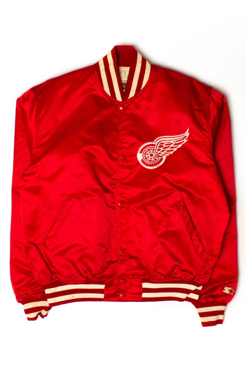 Starter Jackets!!! I had a Red Wings one.