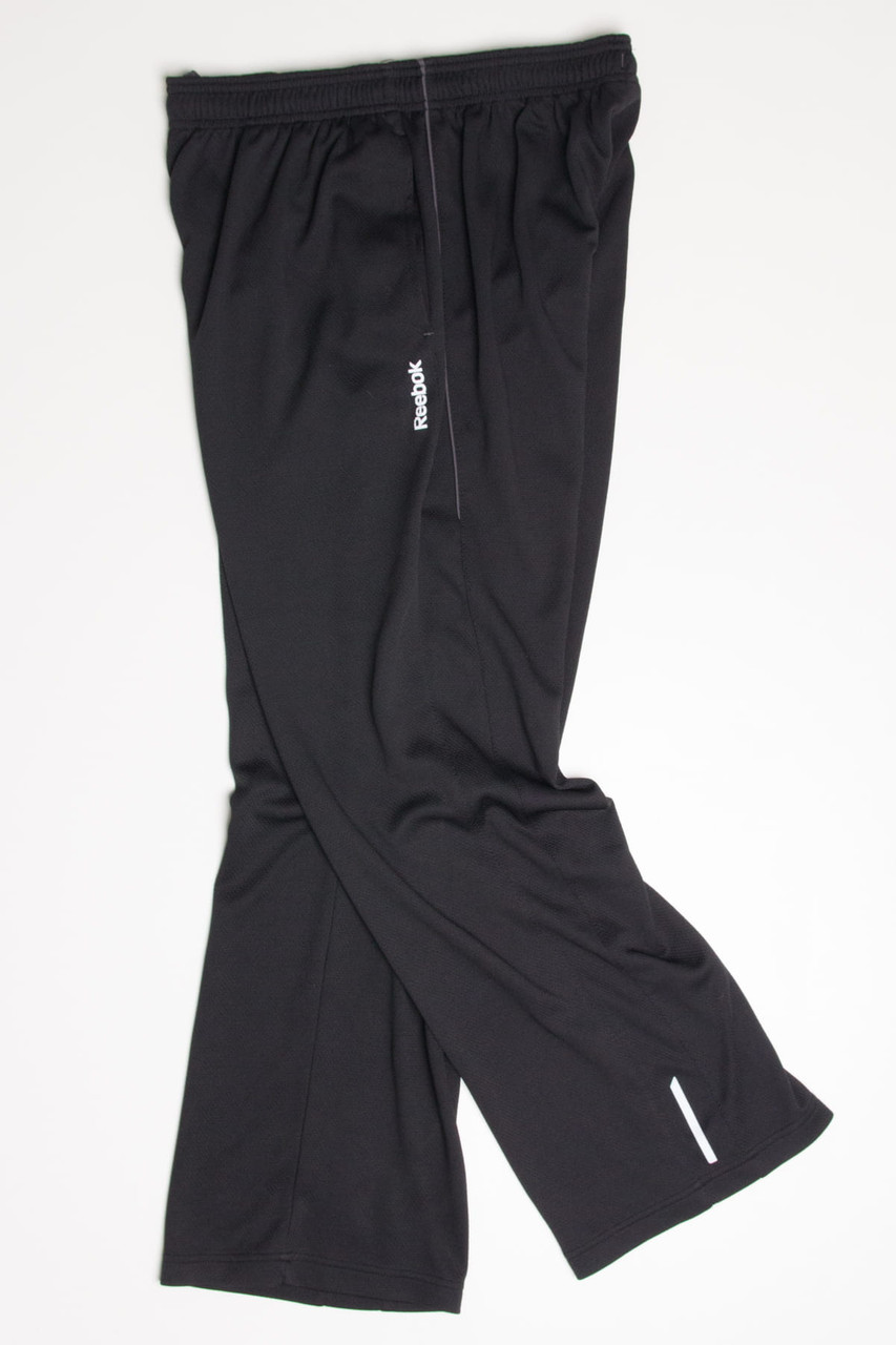 Buy Reebok men vector track pants black Online | Brands For Less