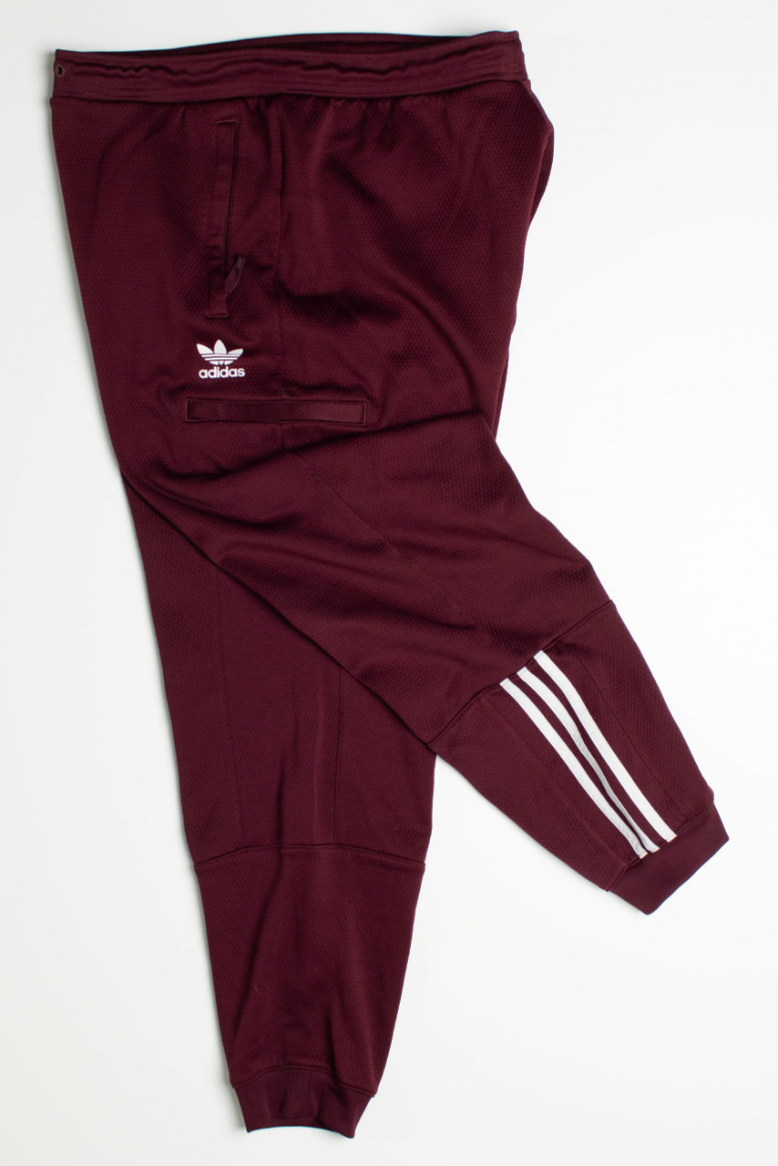 https://cdn11.bigcommerce.com/s-mplfu2e611/images/stencil/1280x1280/products/84954/138025/vintage-track-pants-506-1-scaled__11257.1666807790.jpg?c=1&imbypass=on