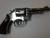 USED SMITH AND WESSON MODEL 10-5 NICKLE IN VERY GOOD CONDITION 