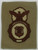 Unknown (brn on material) K